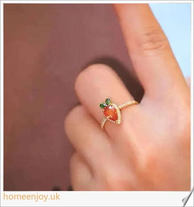 A close-up image of a copper ring with a whimsical carrot-shaped design and micro-inlaid details, showcasing a playful and charming accessory.