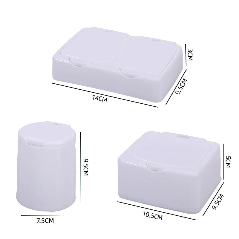 Three white plastic storage boxes for organising eyelash extension tools and accessories