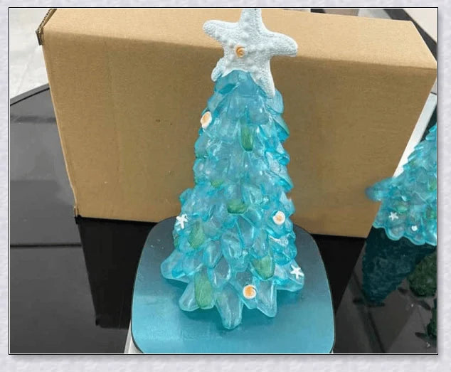 Handcrafted sea glass Christmas tree in coastal blue, green, and turquoise colours