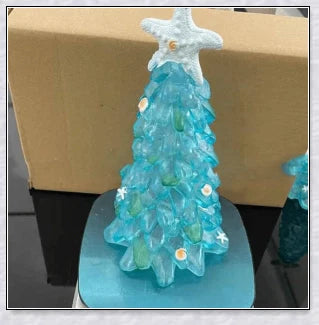 Handcrafted sea glass Christmas tree in coastal blue, green, and turquoise colours