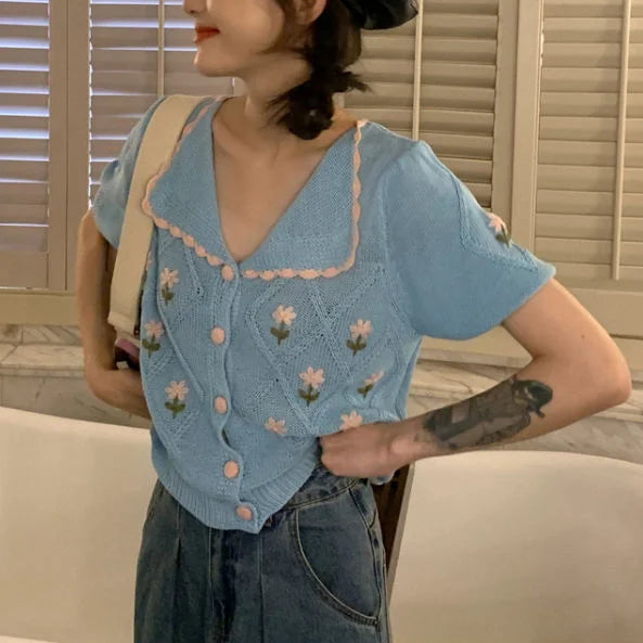 French-inspired short-sleeved cardigan with embroidered details in summer yellow and sky blue colours