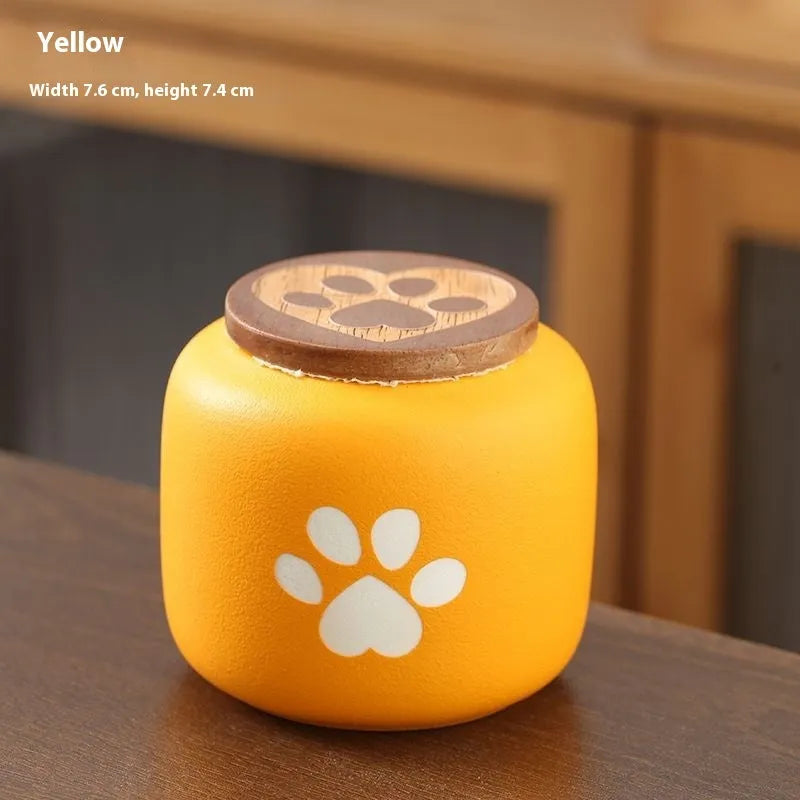 Ceramic pet funeral urn with foot print design in choice of colours and 180ml or 500ml sizes