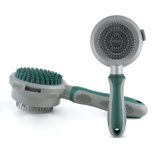 Green and pink dual-sided pet brush showing slicker pins and silicone massage nubs on a wooden table.