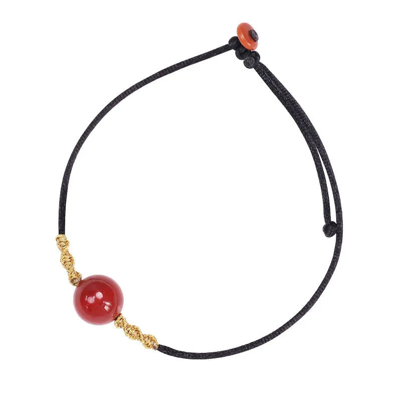 Hand-woven red agate bracelet and necklace set for women in national style with bead design.