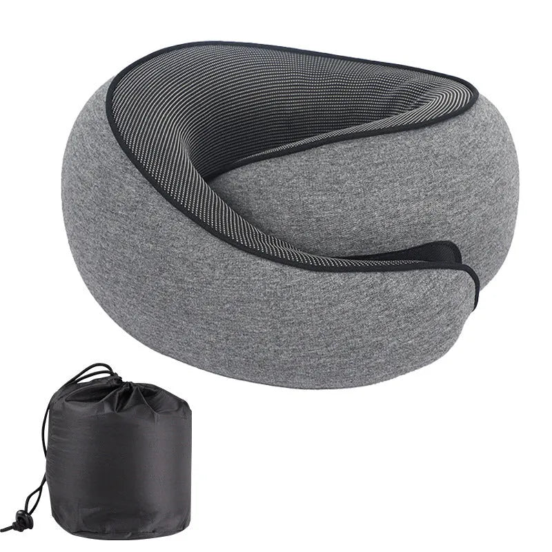 U-shaped memory foam neck pillow for travel shown with its storage bag.
