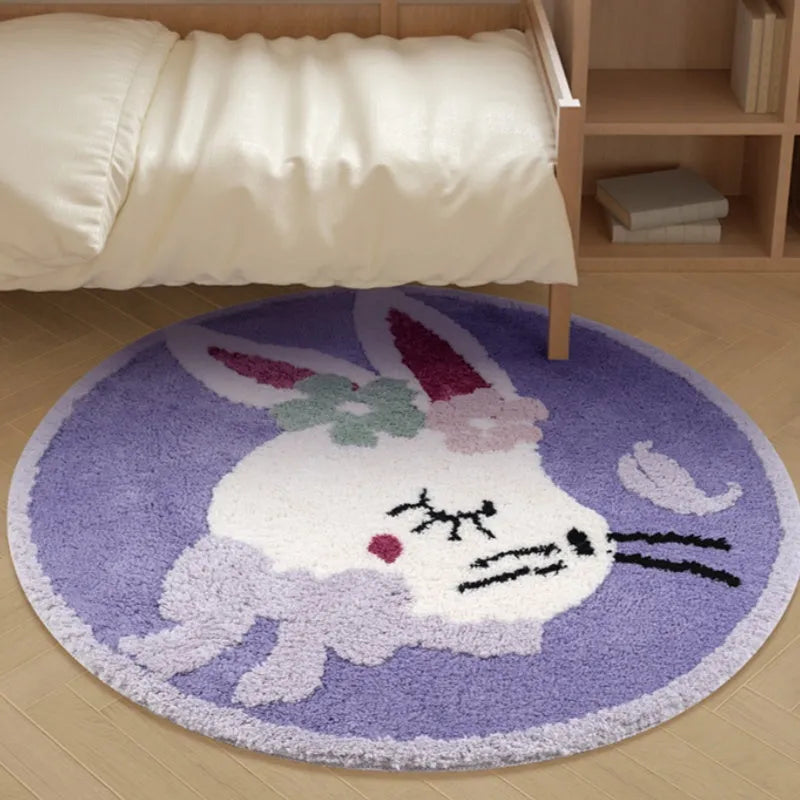 Round soft polyester children's floor carpet in forest green with anti-slip backing, shown beside a bed.