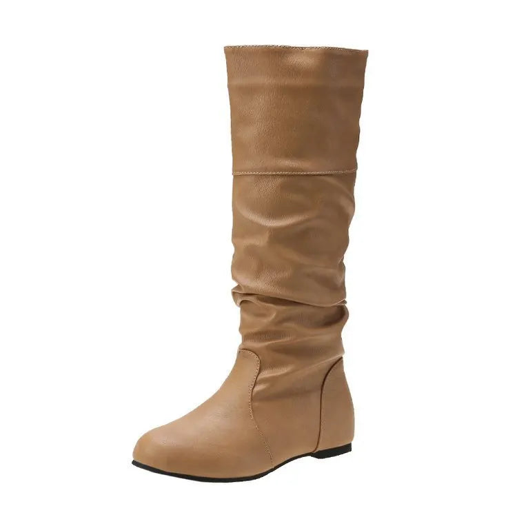 Women's flat heel long boots in black, slip-on style with a high cylinder shaft and rubber sole.