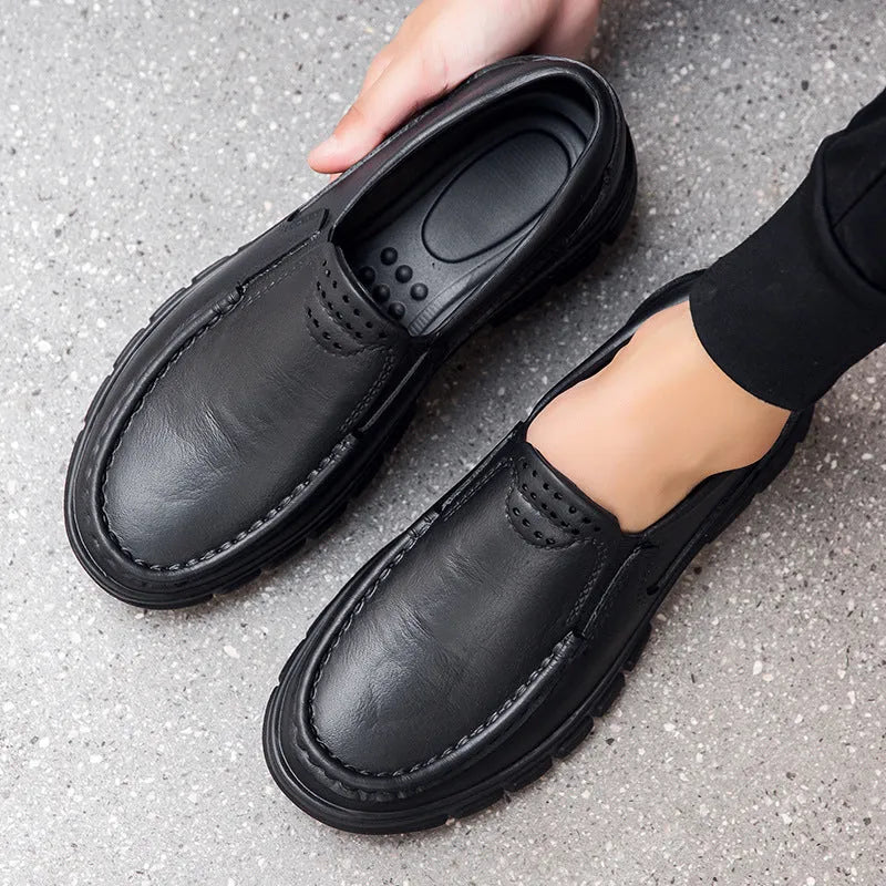 Men's black slip-on leather shoes with platform heel and round toe design