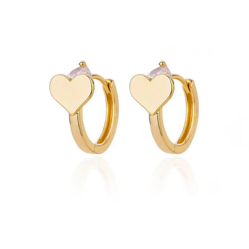 Stud earrings for women with a simple zircon love heart design, crafted from titanium steel with an 18K finish, featuring secure ear clip fastenings for a comfortable and fashionable jewellery accessory.