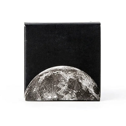 Box containing 45 black moon phases and calendar planet decorative stickers on self-adhesive paper.