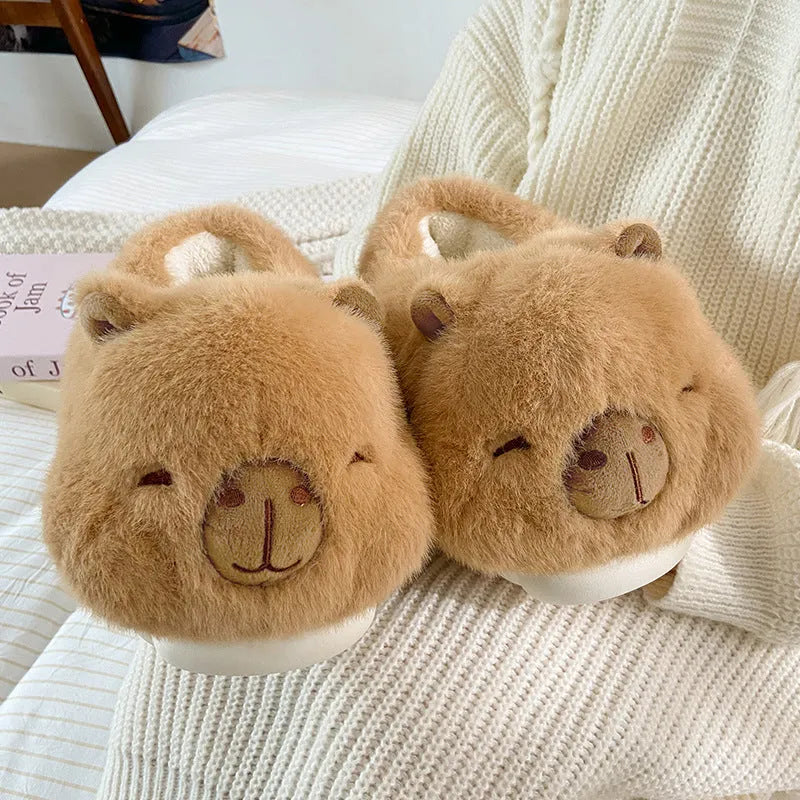 Light brown women's fleece slippers with round toe design and PVC sole