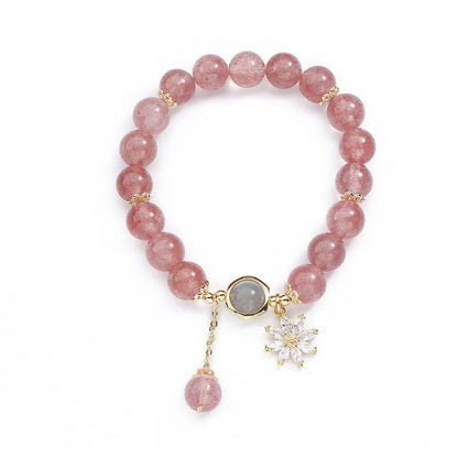 Korean Mori style crystal bracelet with a strawberry quartz bead and floral electroplated metal details