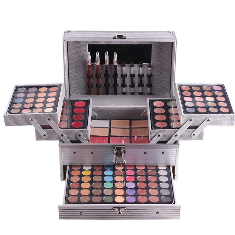 Multifunctional makeup artist kit showing 94 colour eye shadow palette with concealers, lipsticks, and application tools