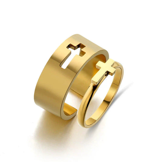 Elegant titanium steel rings in various designs including hearts, butterflies, and crosses, for a timeless and versatile accessory