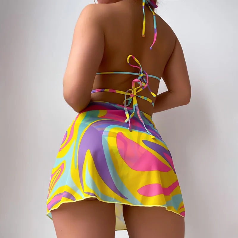 Yellow striped women's halter neck lace-up swimsuit with matching skirt and shorts