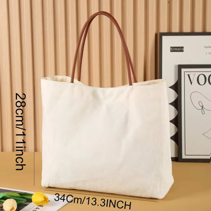 Cotton canvas tote bag shown in beige white and white colour options.