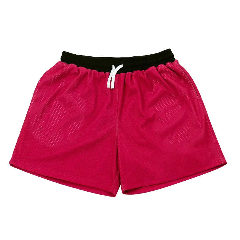 Men's black mesh running shorts with an elasticated waistband and drawcord, laid flat.