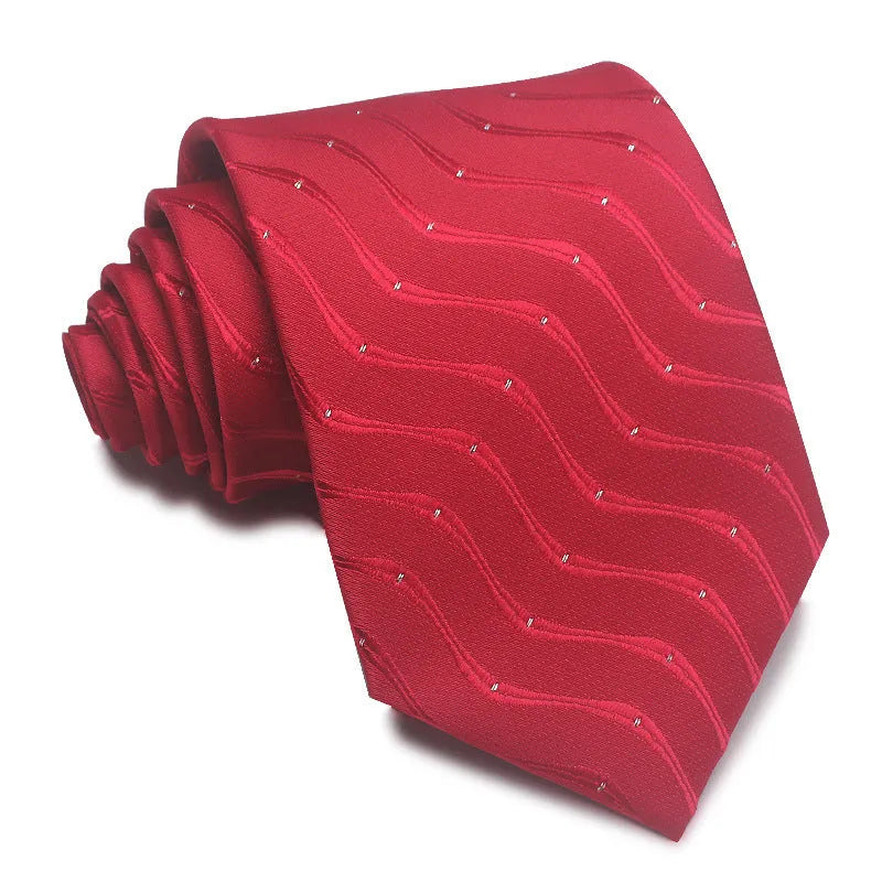 Close-up of a red and black striped men's business tie with a textured Jacquard weave, showing the 8cm width and arrow point shape.