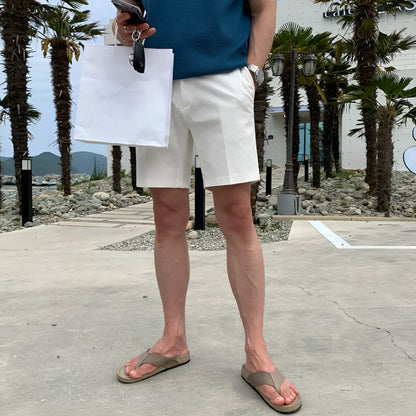 Men's loose straight casual shorts in black, khaki, and white solid colours.