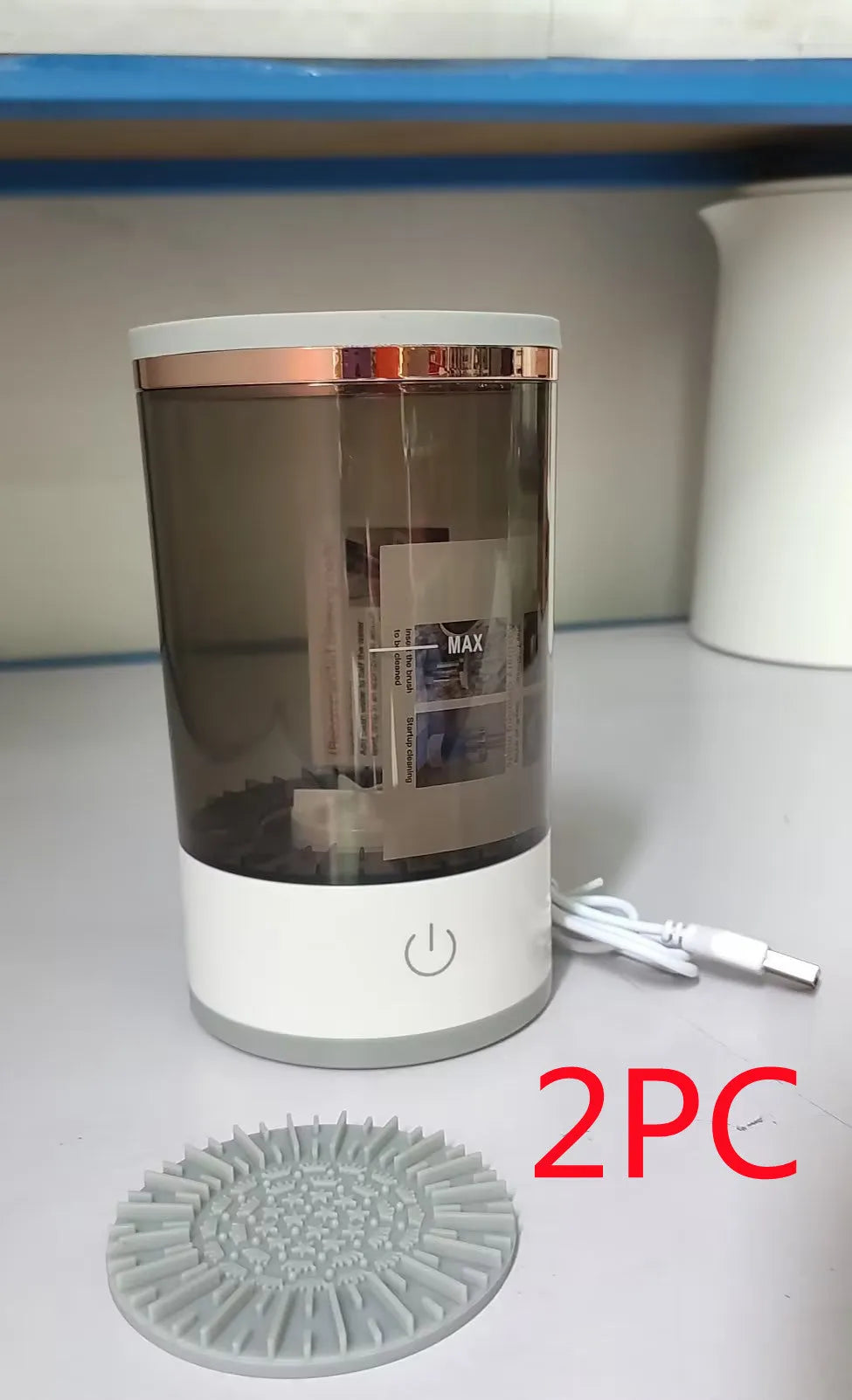 Grey and white portable electric makeup brush cleaner machine with USB charging cable