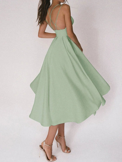 Elegant V-neck dress with adjustable straps, available in a range of vibrant colours for stylish summer wear