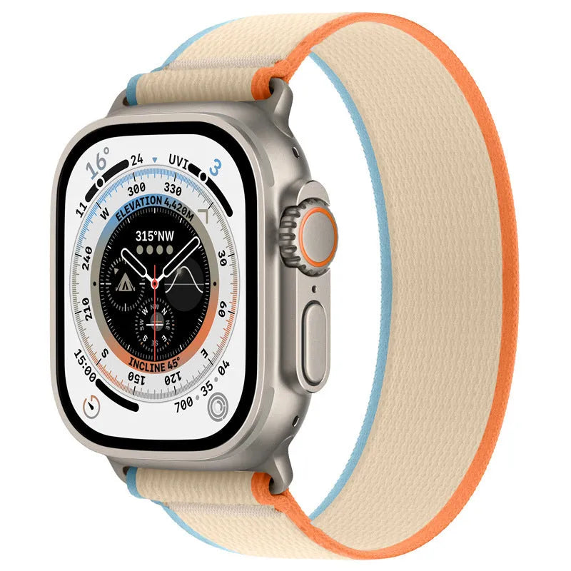 Nylon Apple Watch band with single ring strap closure in multiple colour options on a wrist