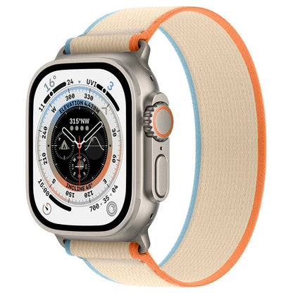 Nylon Apple Watch band with single ring strap closure in multiple colour options on a wrist