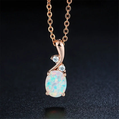 Water drop opal pendant on an adjustable O-shaped alloy necklace in rose gold or white.