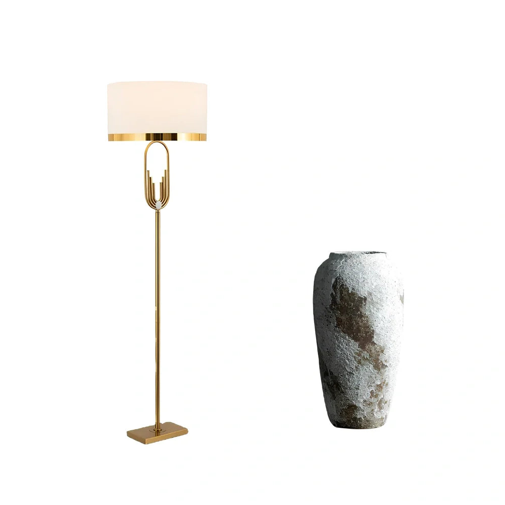 Modern vertical floor lamp with adjustable height and fabric shade for reading and desk work