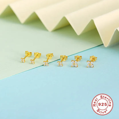 S925 sterling silver stud earrings with a geometric petal crystal flower design in gold or platinum finish.