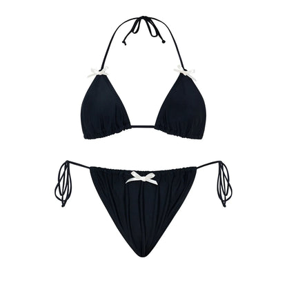 Women's solid colour bikini swimsuit with a bow tie detail, shown in one of five available colours.