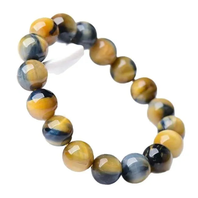 Fantasy tiger eye agate unisex bracelet with round beads in geometric single-circle design.
