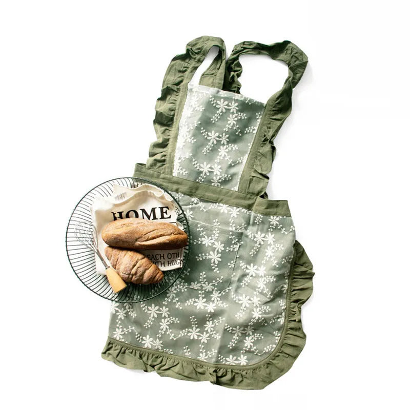Cotton linen kitchen apron with lace-trimmed X straps in solid colour