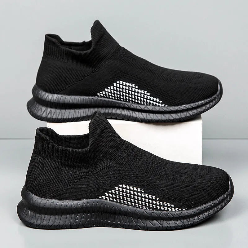 Low-top casual sneaker in Popcorn Flyknit fabric, showing flat heel and round toe design.