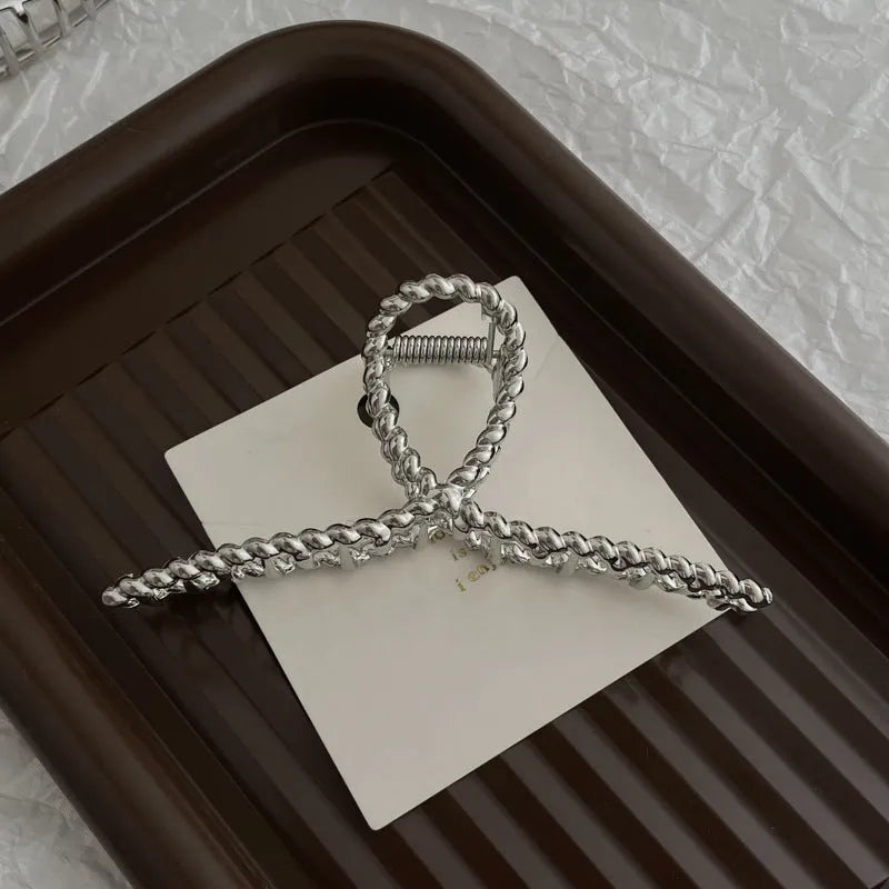 Silver metal hair claw barrette example from a range of 44 Korean-style designs.