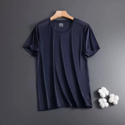 Man wearing a solid colour ice silk short sleeve t-shirt with a crew neck in a loose, casual fit for summer.