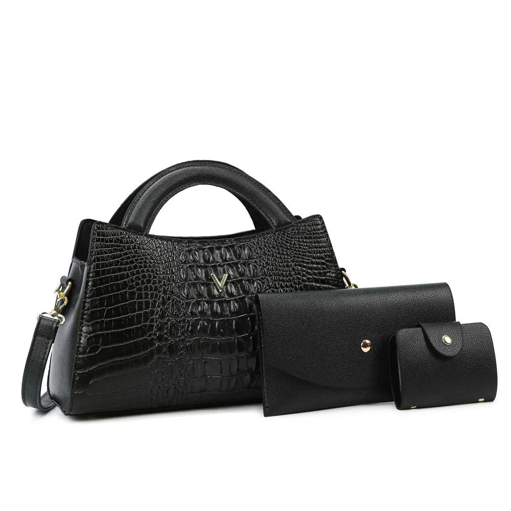 Women's square crossbody bag in crocodile pattern PU leather, showing internal organiser pockets.