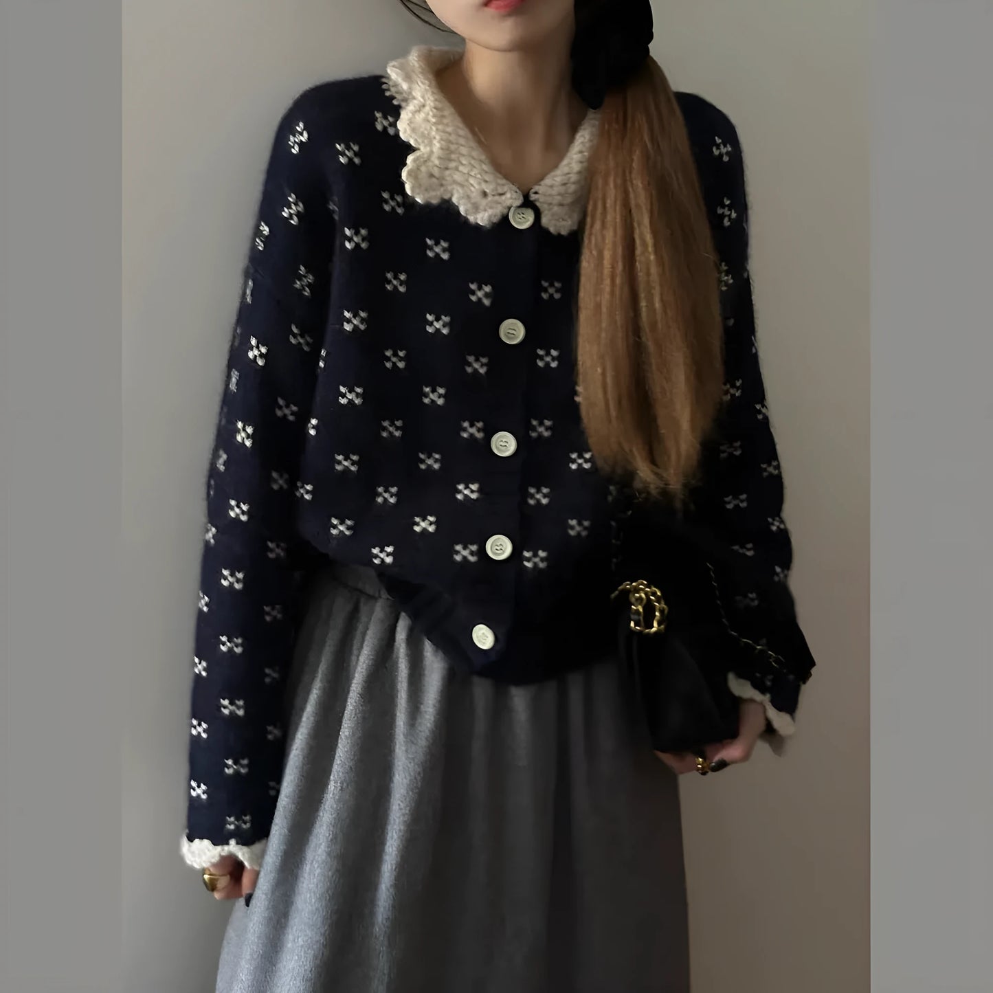 Women's floral pattern knit cardigan with Peter Pan collar in navy blue colour