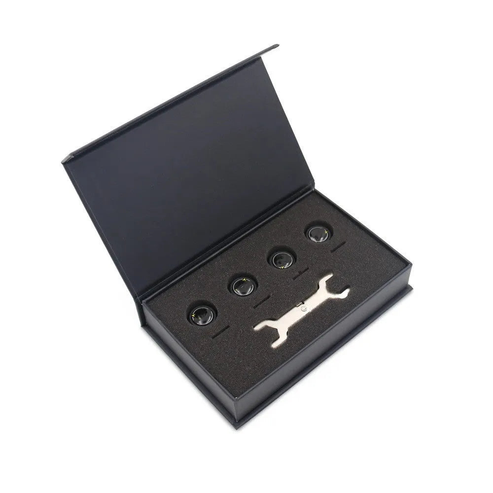 Bluetooth 5.0 automotive tyre pressure monitoring system with four black external sensors, a wrench, and anti-theft screws.
