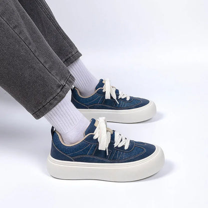 Men's platform casual shoes with raised sole in black colour showing round toe and lace-up front