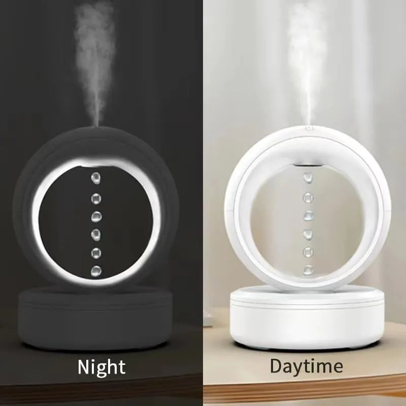 Anti-gravity desk humidifier with levitating water droplet effect, USB-powered aroma diffuser for home and office use, 0.5-1 litre capacity white plastic humidifier with ultrasonic mist technology and silent operation