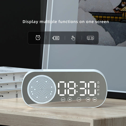 Versatile Bluetooth alarm clock with mirror finish, FM radio, and phone holder