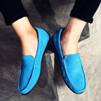 Men's suede casual loafers in brown with a round toe and rubber sole, shown in a UK plus size.