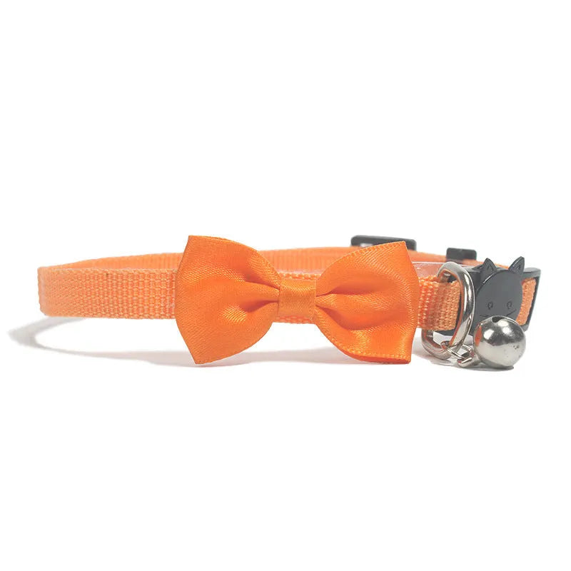 Adjustable nylon cat collar with bell decoration in striped pattern, multiple colour options available