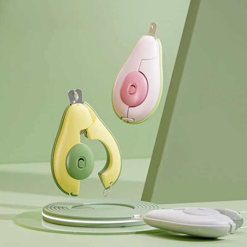 Professional pet nail clipper with LED light, a claw grooming scissors for small dogs and cats, available in green, pink, and white colour options, designed as a pet grooming accessory for safer at-home trimming.