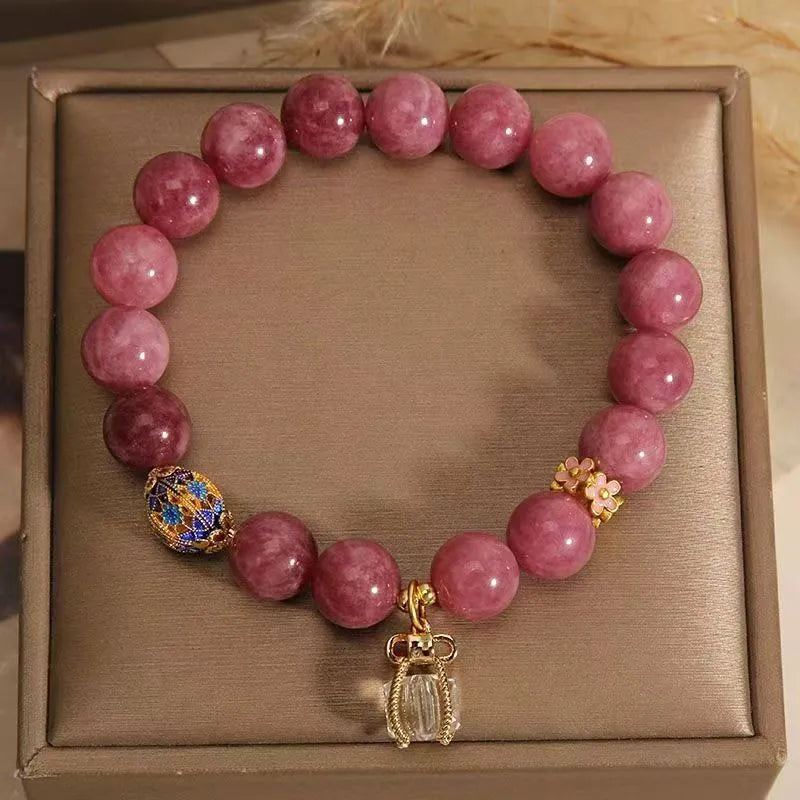 Pink lotus tassel natural stone bracelet with pearl pendant and flower charm.