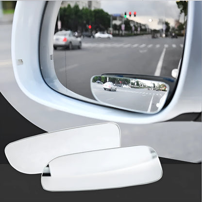 Glass adjustable blind spot rearview mirror with sponge adhesive backing for car installation.