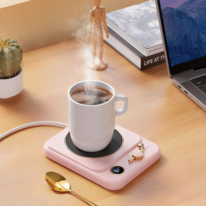 White plated collage desktop warming pad with digital temperature display showing current heating status