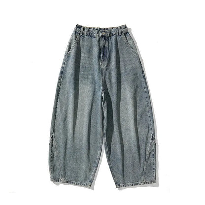 Men's plus-size light blue wide-leg baggy jeans on a neutral background.