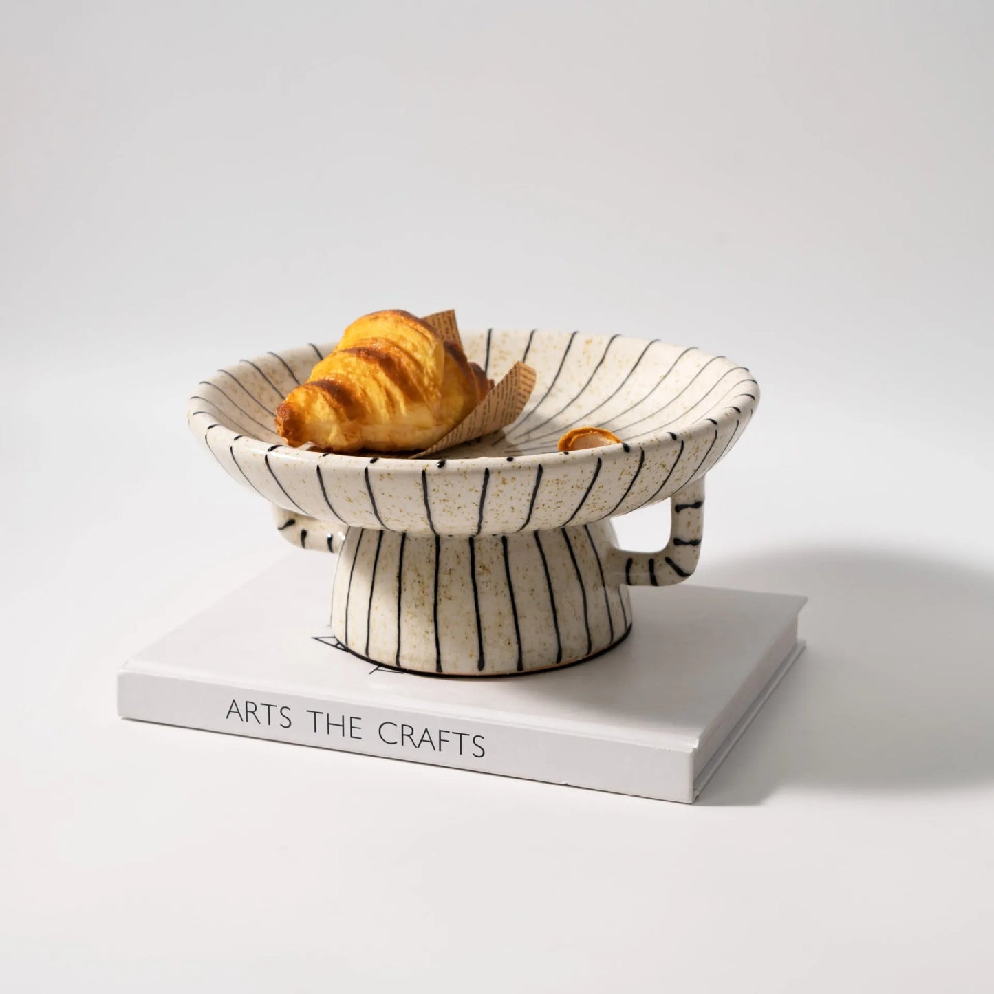 Black and white striped synthetic resin fruit plate with retro fruit motifs, 20cm diameter